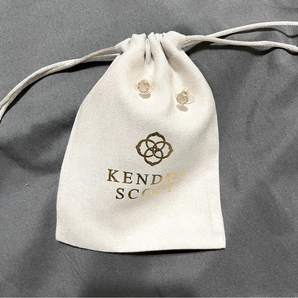 Kendra Scott clear drusy small studs. Asymmetrical shaped. Pierced studs.